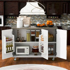 Îlot de cuisine rétro de 129,5 cm de large avec plateau abattant, 4 roulettes, étagère de rangement interne et porte-serviettes
